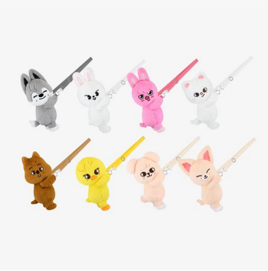 Set of plush animal toys with sticks on a white background